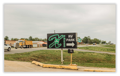 the x-press sign in front of the rv park